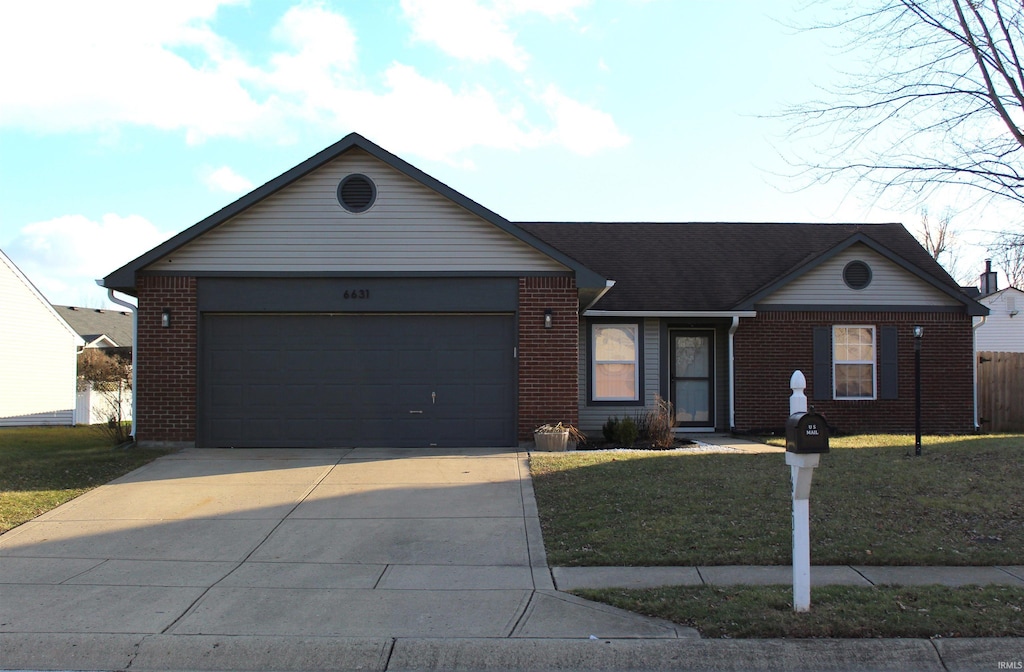 single story home featuring a front yard and a garage