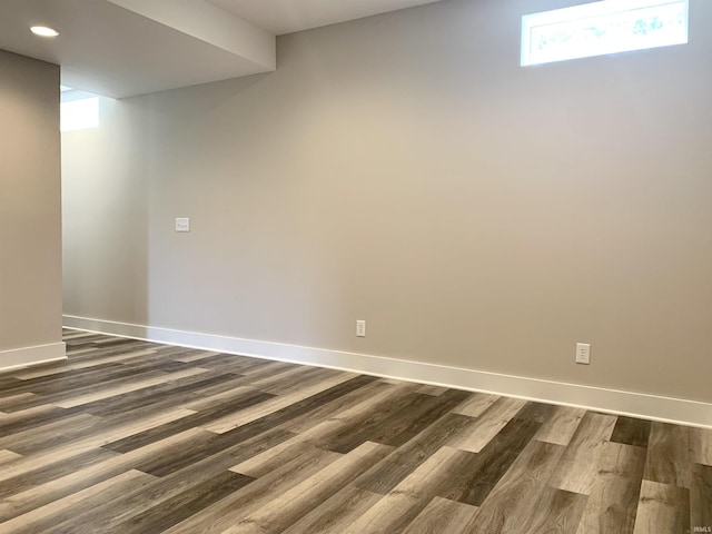 basement featuring dark wood-type flooring