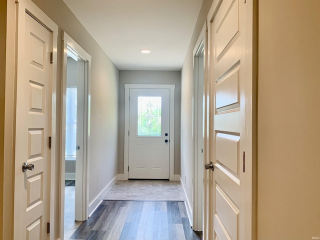 entryway with dark wood-type flooring