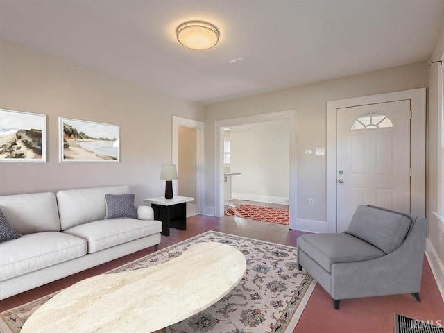 living room with dark hardwood / wood-style floors