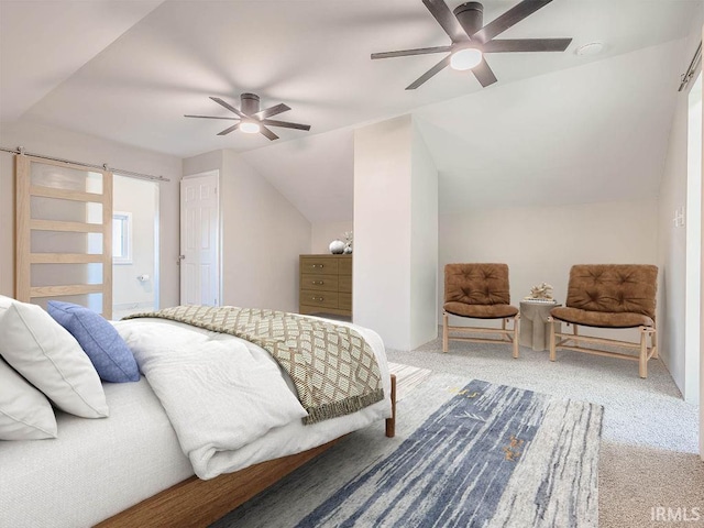 carpeted bedroom with vaulted ceiling and ceiling fan