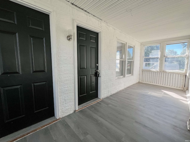 property entrance featuring covered porch