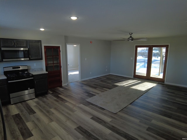 kitchen featuring french doors, stainless steel appliances, dark hardwood / wood-style floors, and ceiling fan