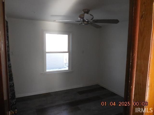 spare room with ceiling fan