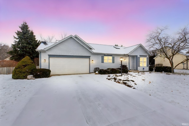 single story home featuring a garage