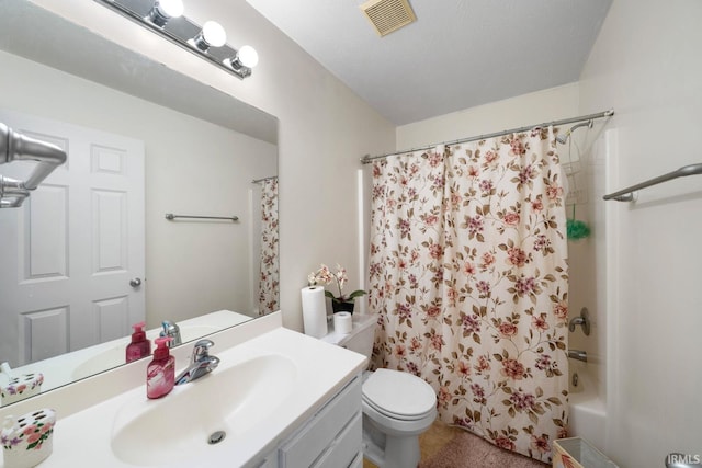 full bathroom featuring toilet, vanity, and shower / tub combo with curtain