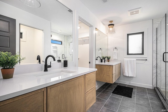 bathroom with vanity and walk in shower