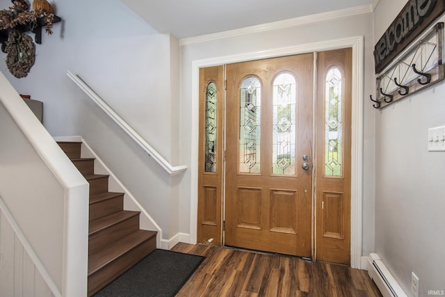 foyer with dark hardwood / wood-style flooring, a baseboard radiator, and ornamental molding