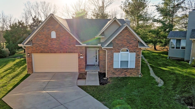 view of front facade with a front yard and a garage