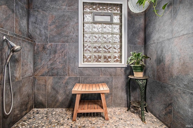 interior space with tiled shower