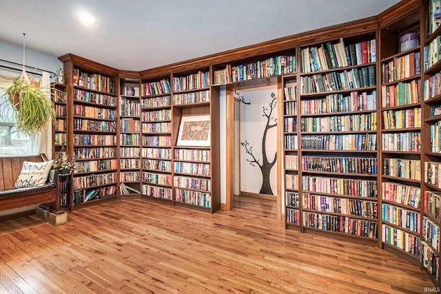 unfurnished room with hardwood / wood-style flooring