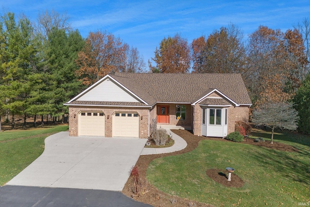 ranch-style house featuring a garage and a front lawn