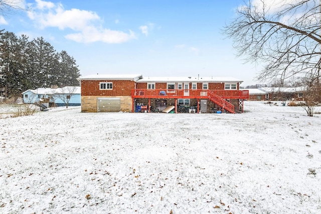 view of snow covered house