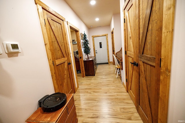 hall featuring light hardwood / wood-style flooring