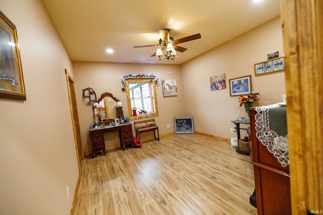 miscellaneous room with ceiling fan and light hardwood / wood-style flooring