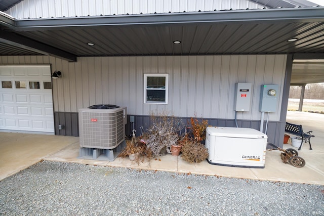 exterior space with a carport and cooling unit