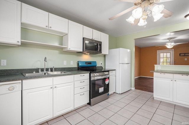 kitchen featuring white cabinetry, sink, and appliances with stainless steel finishes