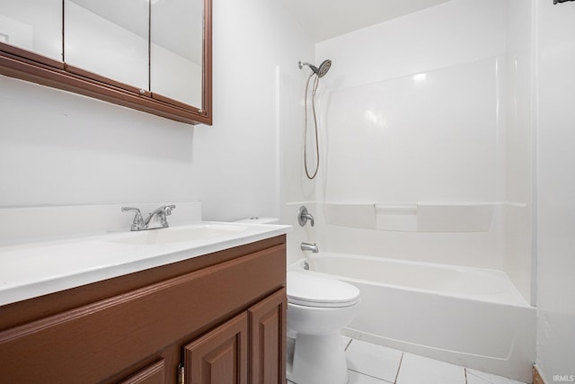 full bathroom featuring tile patterned flooring, vanity, toilet, and shower / washtub combination