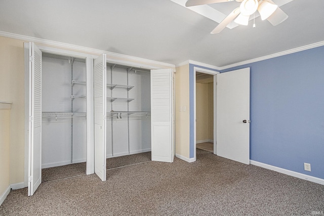 unfurnished bedroom featuring carpet flooring, ceiling fan, and ornamental molding