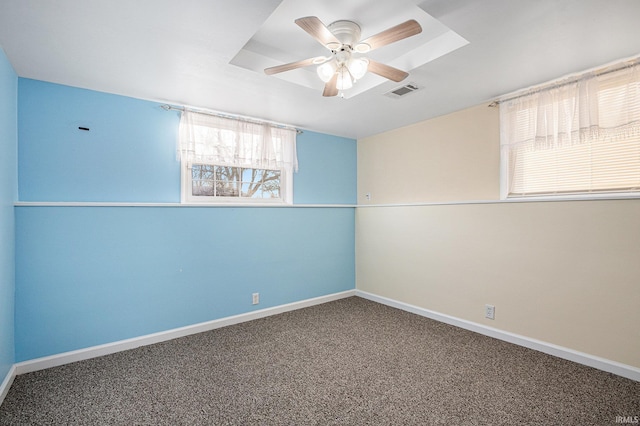 unfurnished room with carpet flooring and ceiling fan