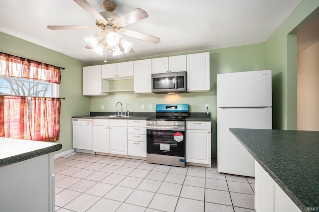 kitchen featuring white cabinetry and appliances with stainless steel finishes