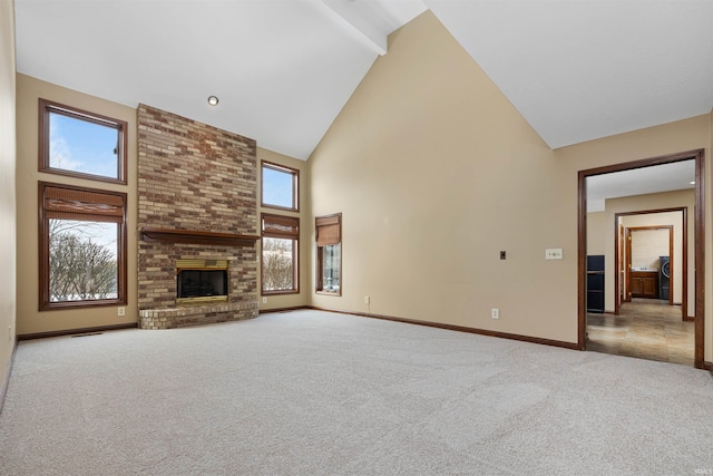 unfurnished living room with light colored carpet, high vaulted ceiling, and a brick fireplace