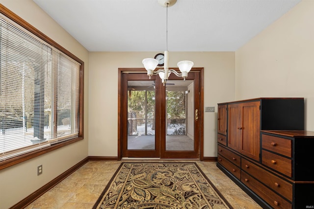 foyer featuring an inviting chandelier