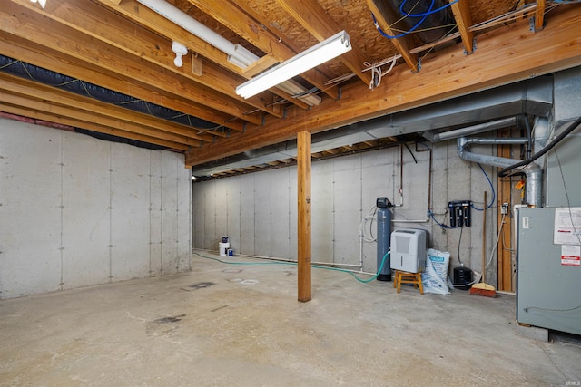 basement featuring heating unit