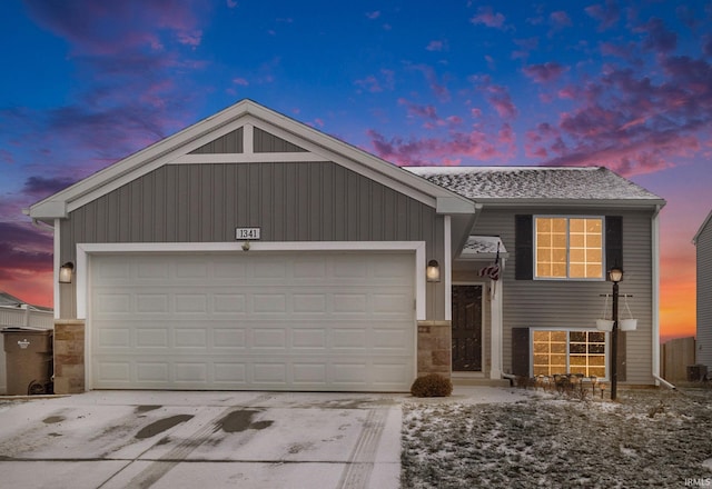 view of front of property with a garage