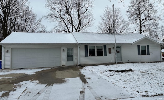 single story home featuring a garage