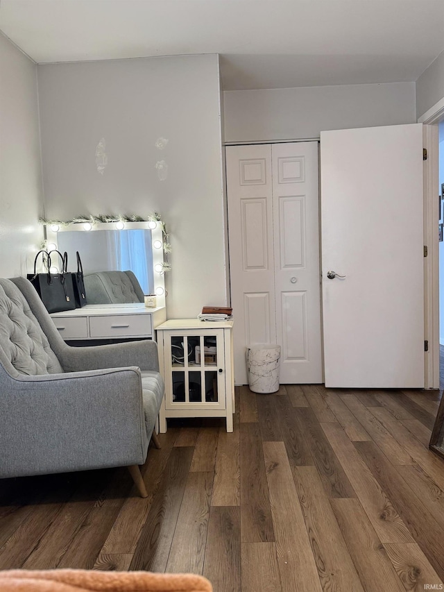 living area featuring dark wood-type flooring