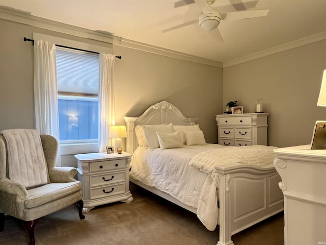 carpeted bedroom with ceiling fan and crown molding