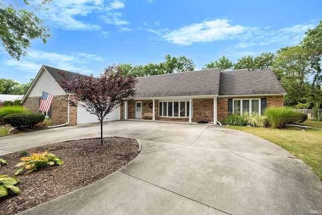 single story home featuring a garage