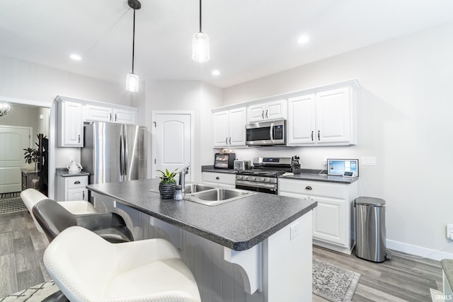 kitchen with white cabinetry and appliances with stainless steel finishes