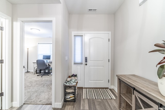 foyer featuring light wood-type flooring