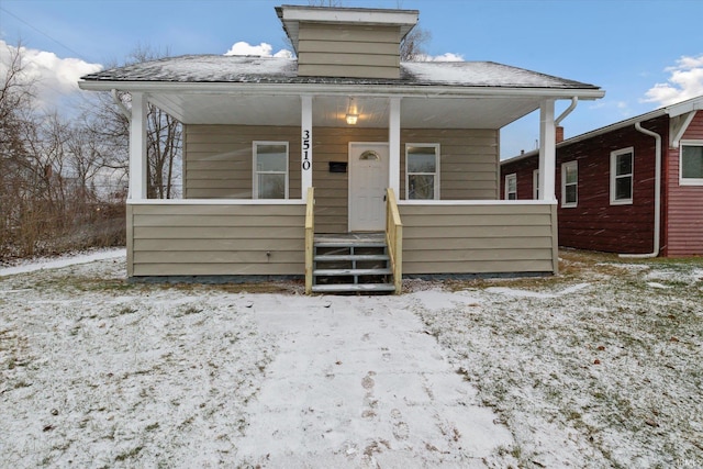 bungalow-style home featuring a porch