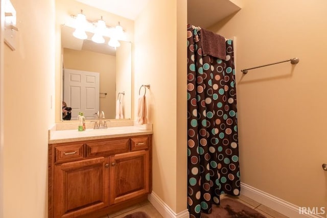 bathroom with vanity and tile patterned floors