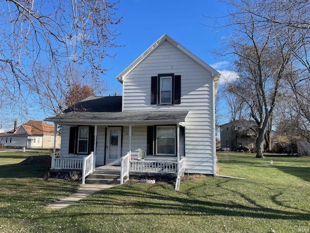 view of front facade featuring a porch and a front lawn