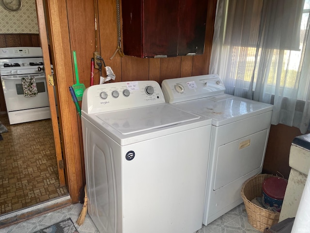 laundry room with separate washer and dryer