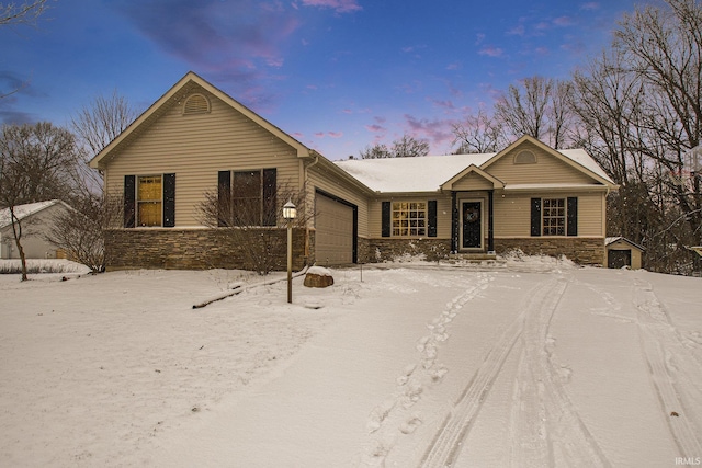 single story home featuring a garage