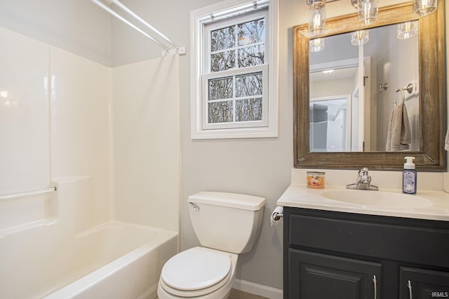 full bathroom featuring vanity, toilet, and washtub / shower combination