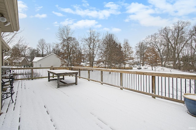 view of snow covered deck