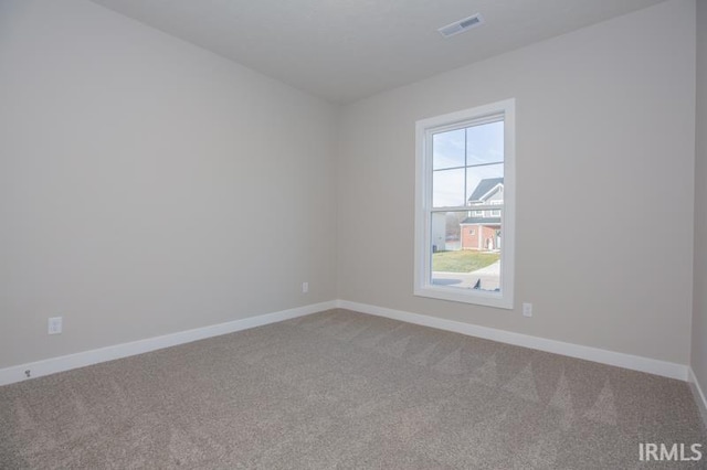 view of carpeted spare room