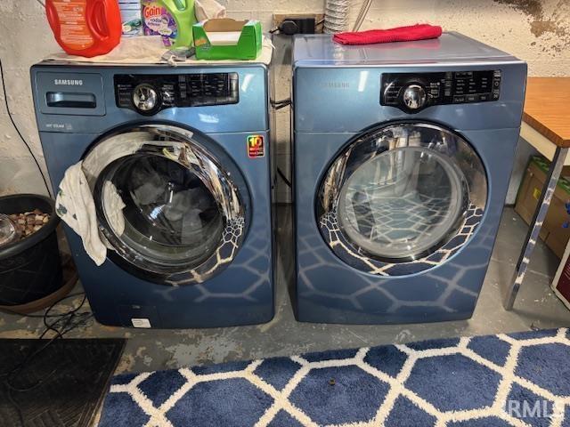 laundry area featuring separate washer and dryer