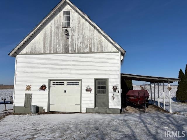 exterior space featuring a garage