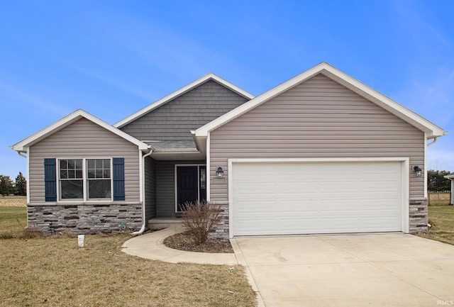 view of front facade with a front lawn and a garage