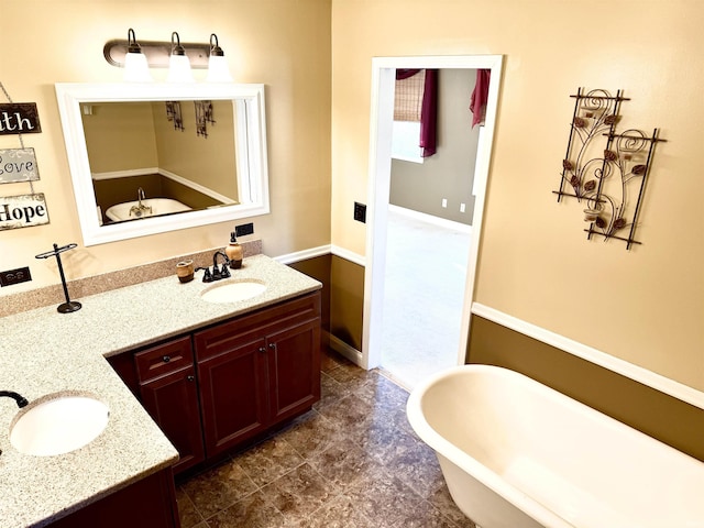 bathroom with a bathing tub and vanity