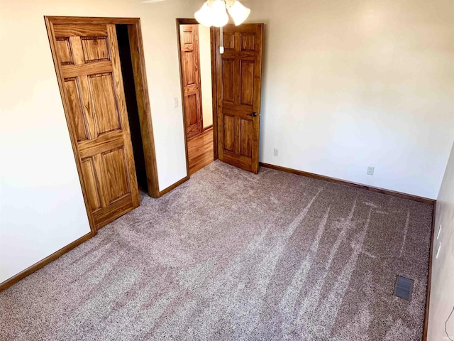 unfurnished bedroom featuring carpet floors