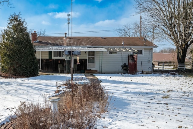 view of snow covered property