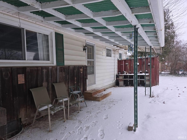 view of snow covered patio